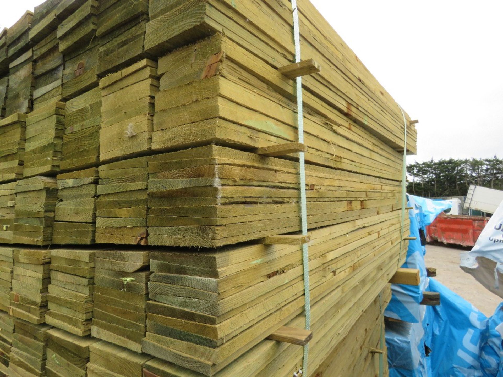 LARGE PACK OF TREATED FEATHER EDGE TIMBER CLADDING BOARDS, 1.35M LENGTH X 100MM WIDTH APPROX. - Image 2 of 3