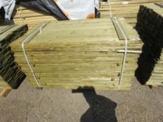 LARGE PACK OF TREATED FEATHER EDGE TIMBER CLADDING BOARDS: 1.5M LENGTH X 100MM WIDTH APPROX.