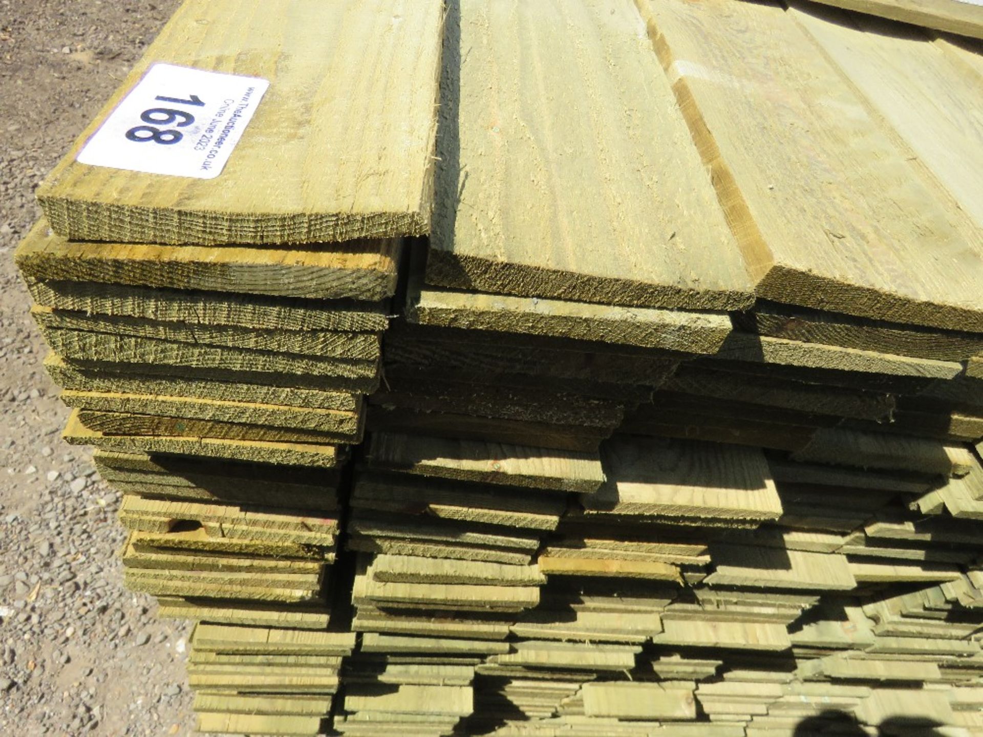 LARGE PACK OF TREATED FEATHER EDGE TIMBER CLADDING BOARDS: 1.8M LENGTH X 100MM WIDTH APPROX. - Image 4 of 4