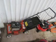 PETROL ENGINED LAWNMOWER WITH COLLECTOR.