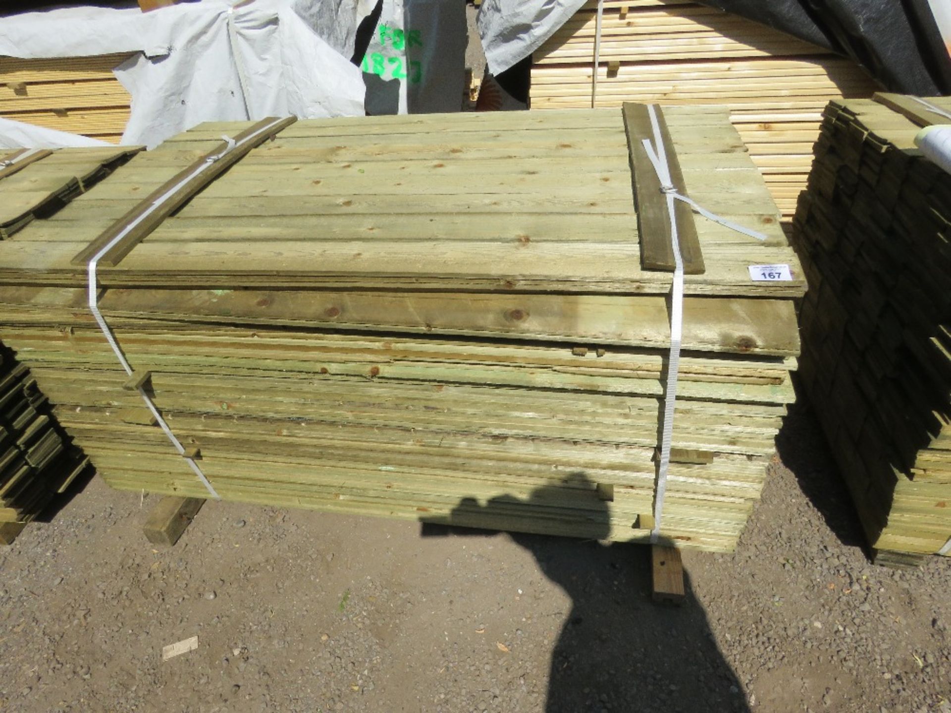 LARGE PACK OF TREATED FEATHER EDGE TIMBER CLADDING BOARDS: 1.65M LENGTH X 100MM WIDTH APPROX.