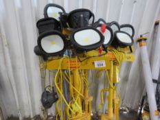 7NO TWIN HEADED 110VOLT WORK LIGHTS.