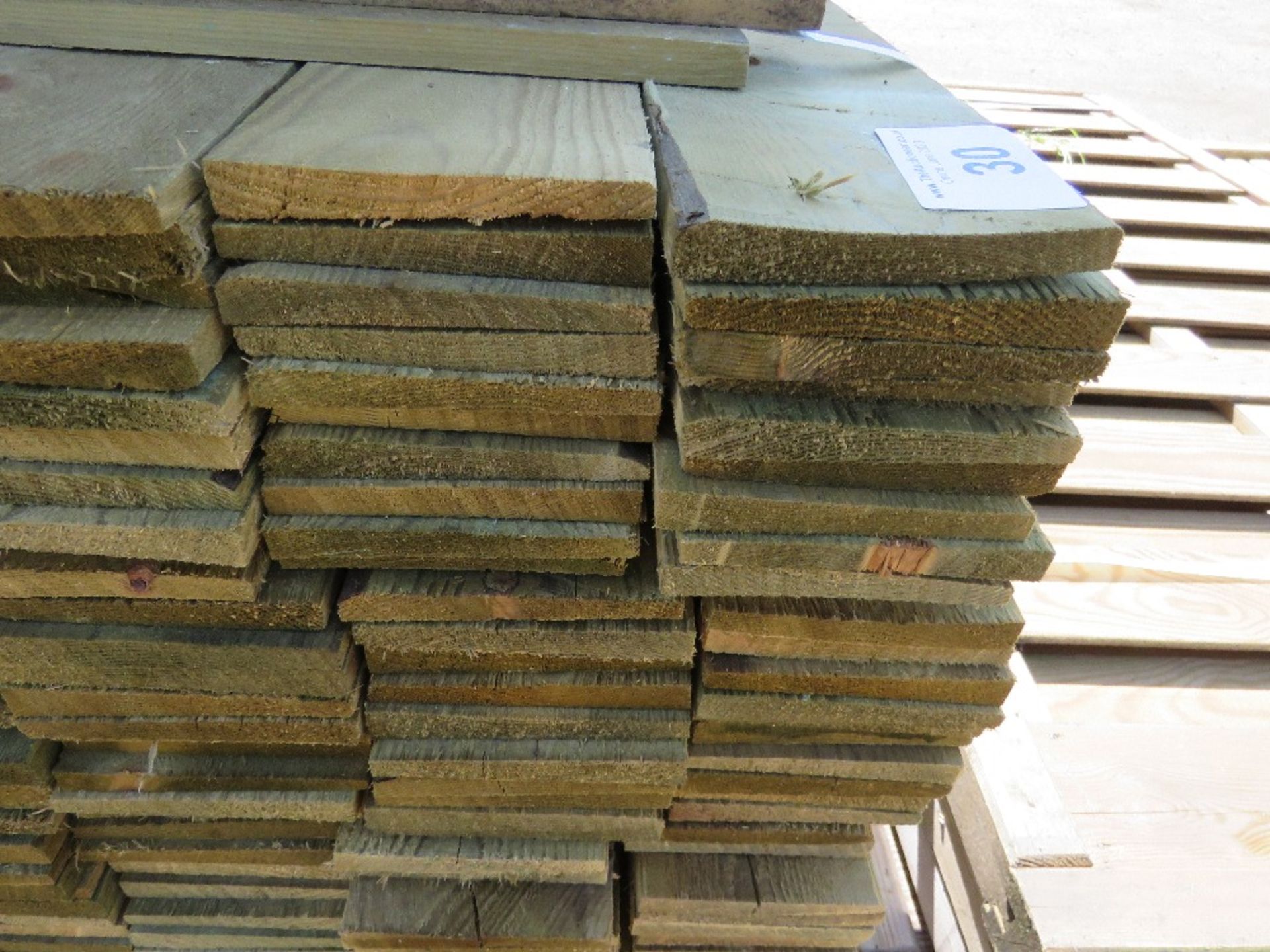 LARGE PACK OF TREATED FEATHER EDGE TIMBER CLADDING BOARDS: 1.8M LENGTH X 100MM WIDTH APPROX. - Image 3 of 4