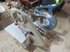 MITRE SAW PLUS A SMALL BANDSAW.