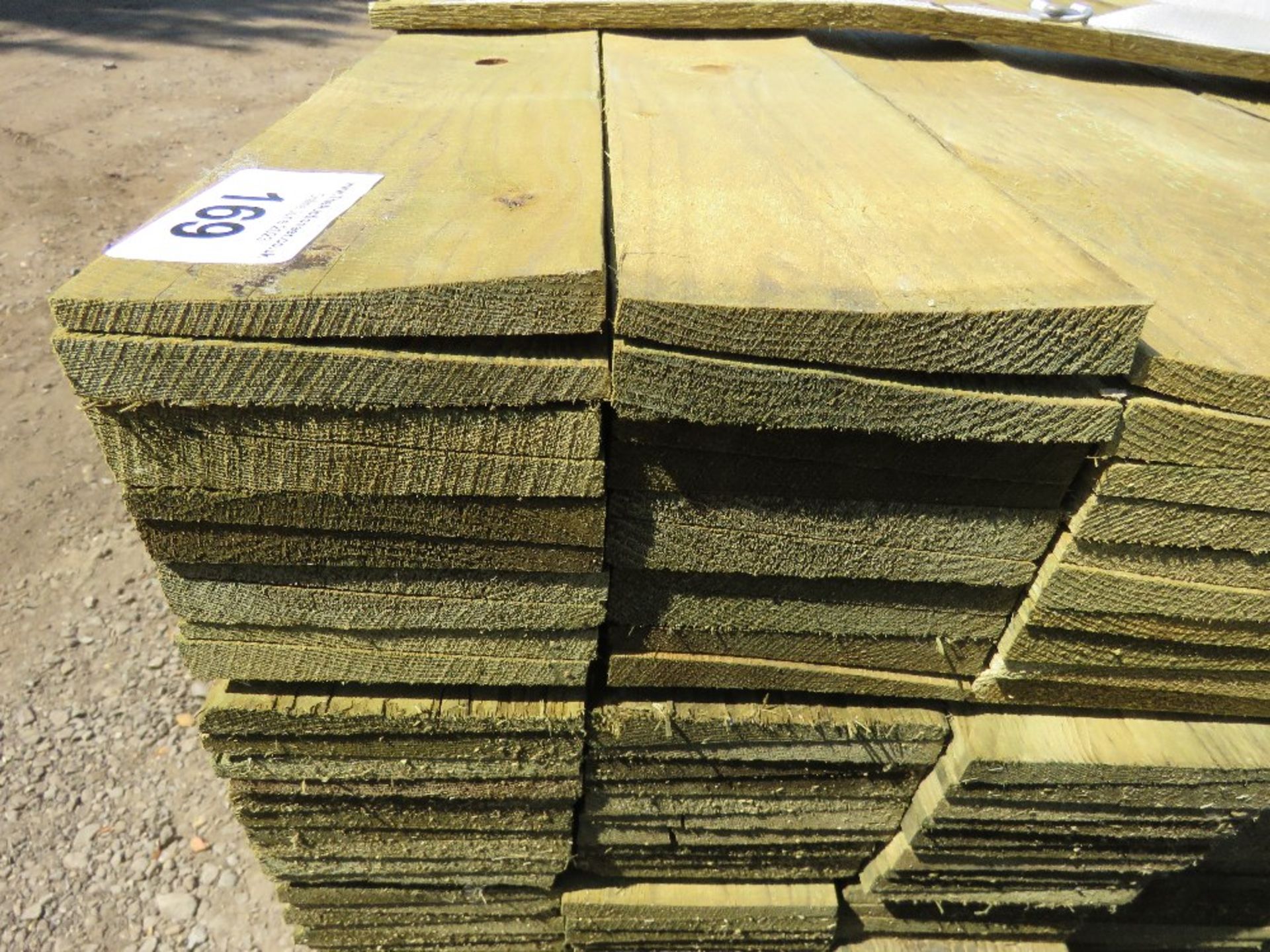 LARGE PACK OF TREATED FEATHER EDGE TIMBER CLADDING BOARDS: 1.8M LENGTH X 100MM WIDTH APPROX. - Image 4 of 4