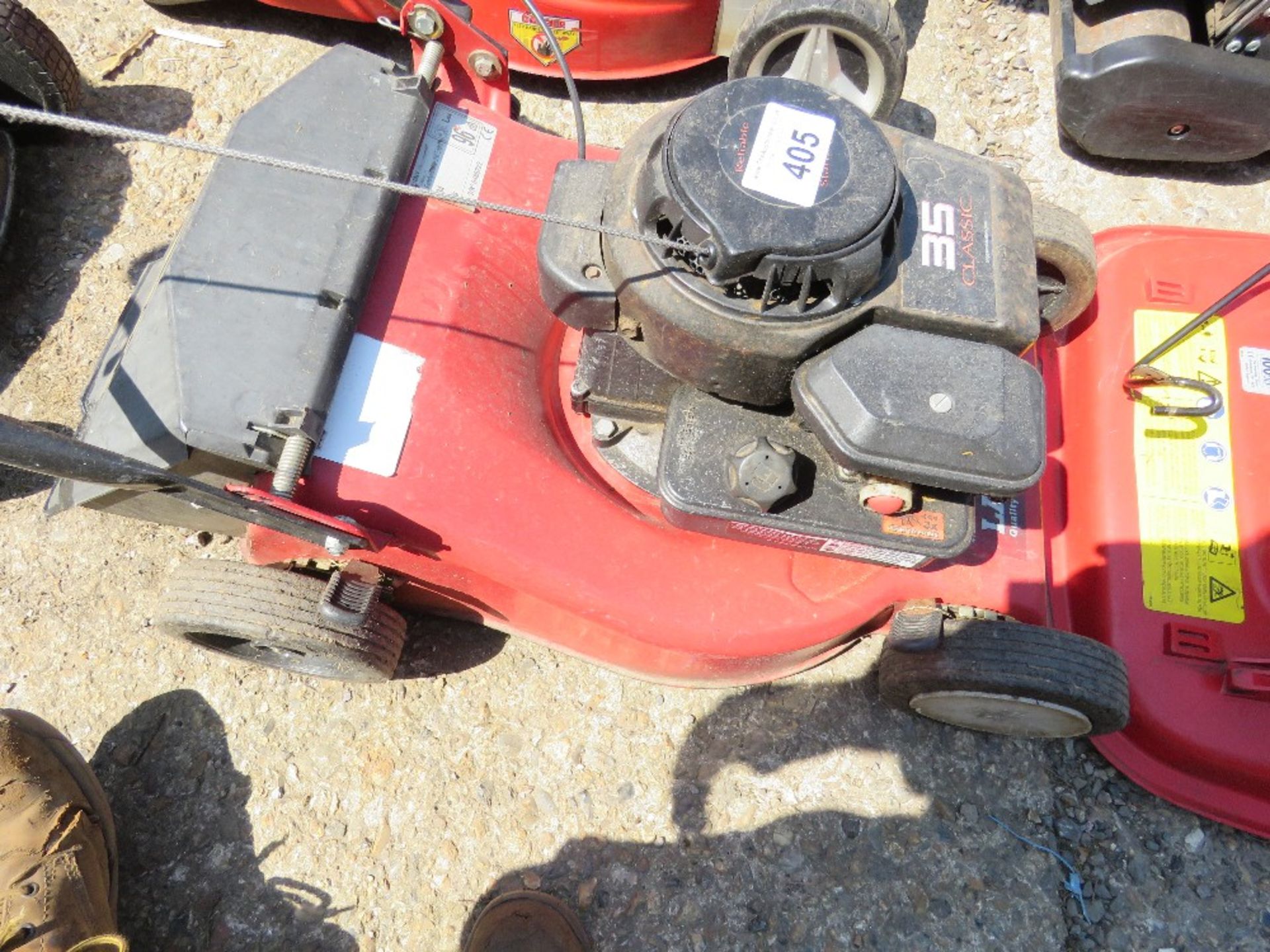 PETROL ENGINED LAWNMOWER, NO COLLECTOR. THIS LOT IS SOLD UNDER THE AUCTIONEERS MARGIN SCHEME, THE