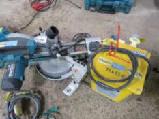 MAKITA SLIDING HEAD MITRE SAW PLUS A TRANSFORMER.