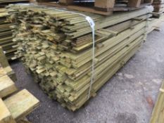 LARGE PACK OF TREATED TIMBER FENCE CLADDING SLATS: 1.75M LENGTH X 40MM WIDTH APPROX.