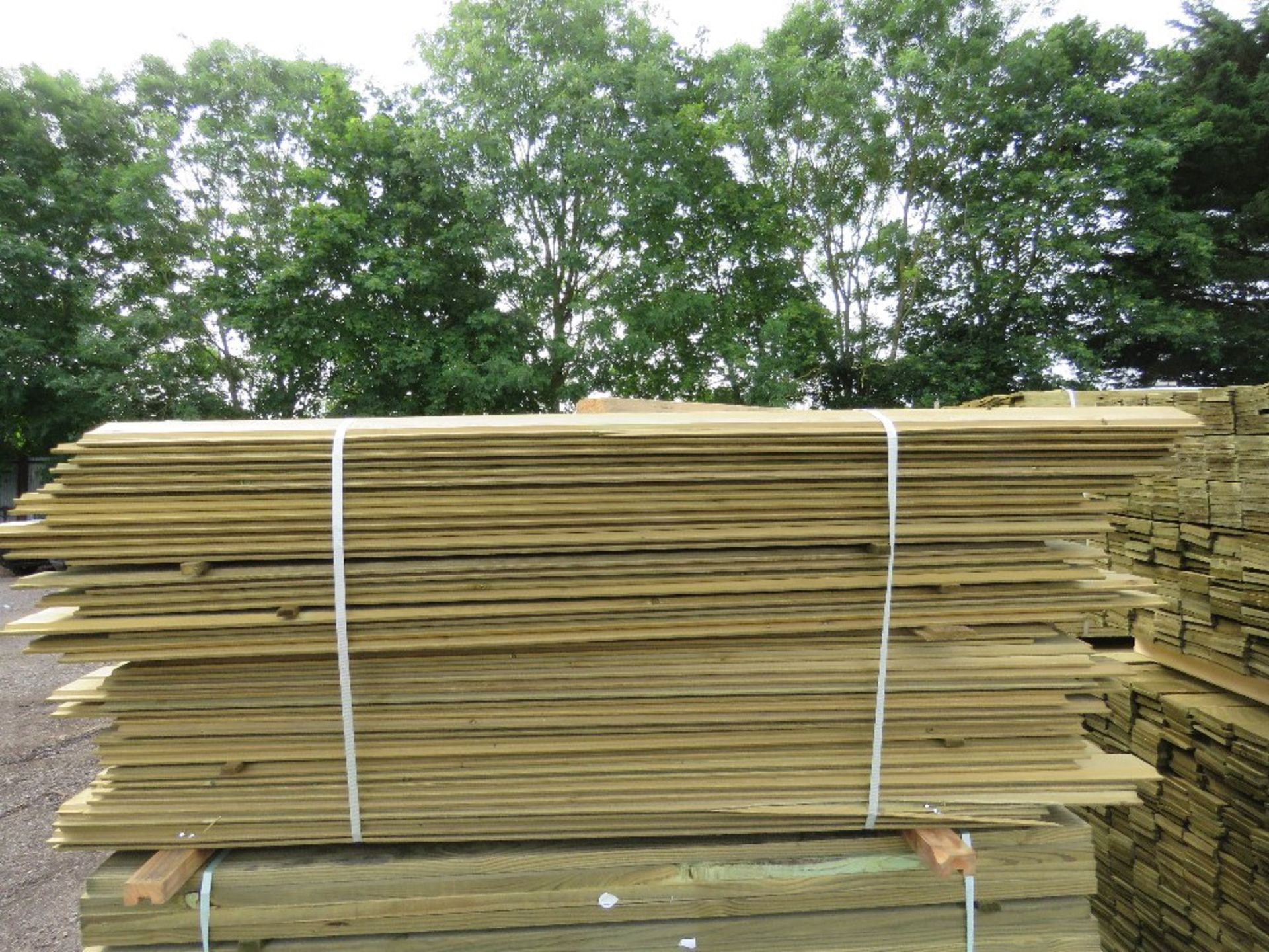 LARGE PACK OF PRESSURE TREATED SHIPLAP CLADDING TIMBER BOARDS. 1.79-1.9M LENGTH X 100MM WIDTH APPROX - Image 2 of 3