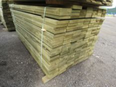 LARGE PACK OF TREATED TIMBER BOARDS 140MM X 30MM X 1.83M LENGTH APPROX. 185NO IN TOTAL APPROX.