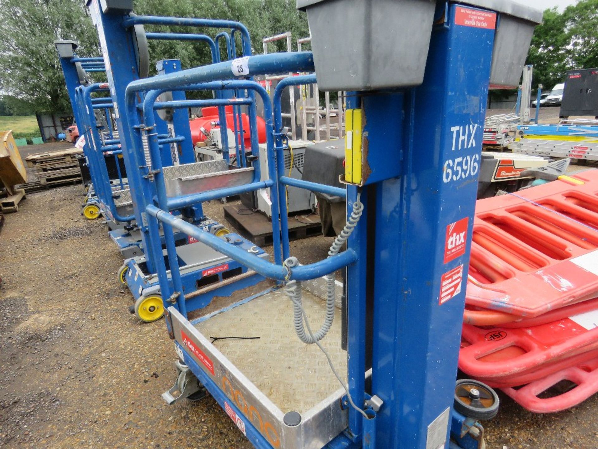 POWER TOWER NANO BATTERY OPERATED MAST ACCESS PLATFORM, YEAR 2018. WIRE TO CONTROLS DAMAGED THEREFOR - Image 9 of 10