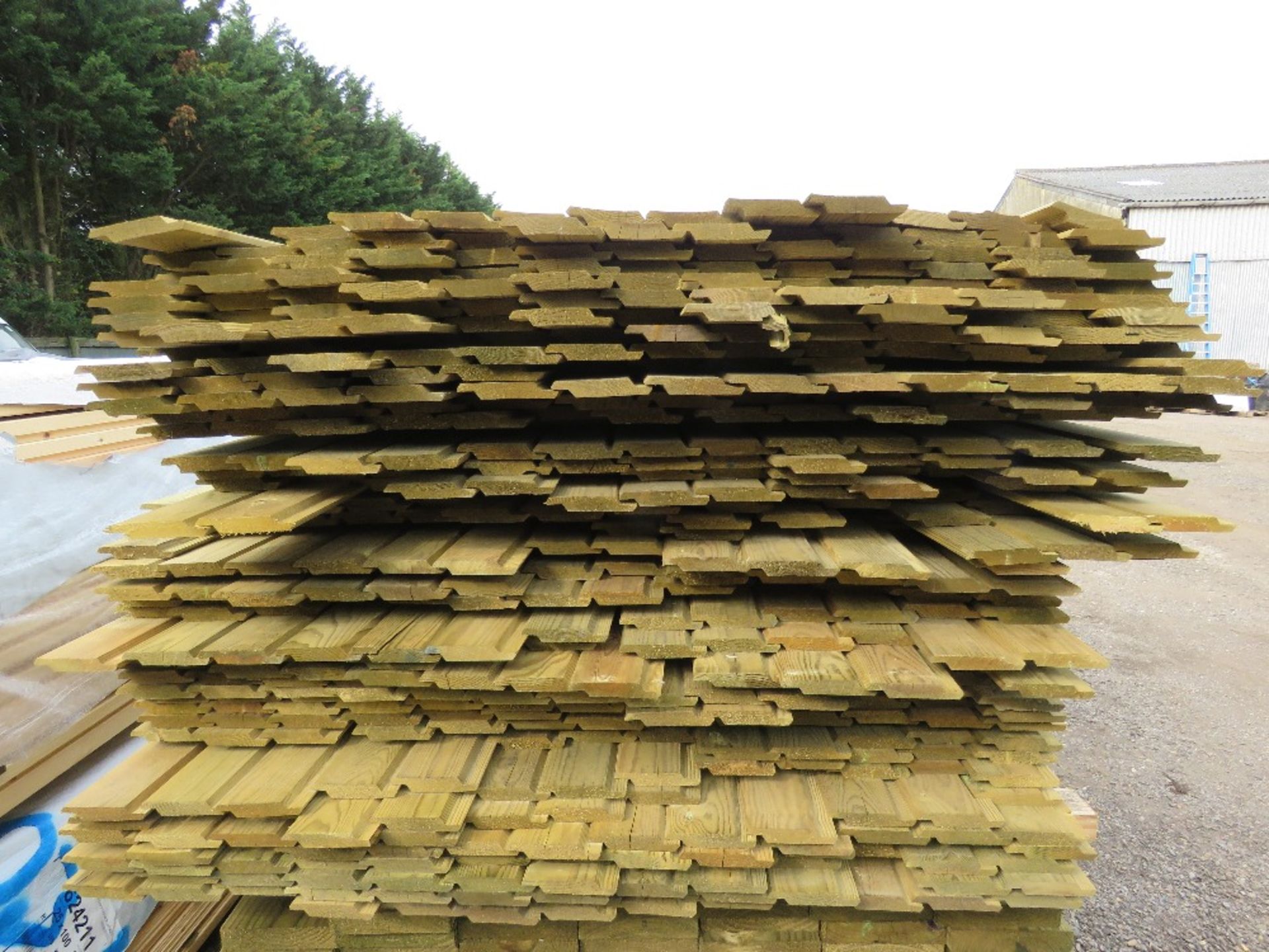 LARGE PACK OF PRESSURE TREATED SHIPLAP CLADDING TIMBER BOARDS. 1.79-1.9M LENGTH X 100MM WIDTH APPROX