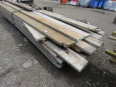 LARGE STACK OF ASSORTED LENGTH SCAFFOLD BOARDS 5-14FT LENGTH APPROX. THIS LOT IS SOLD UNDER THE A