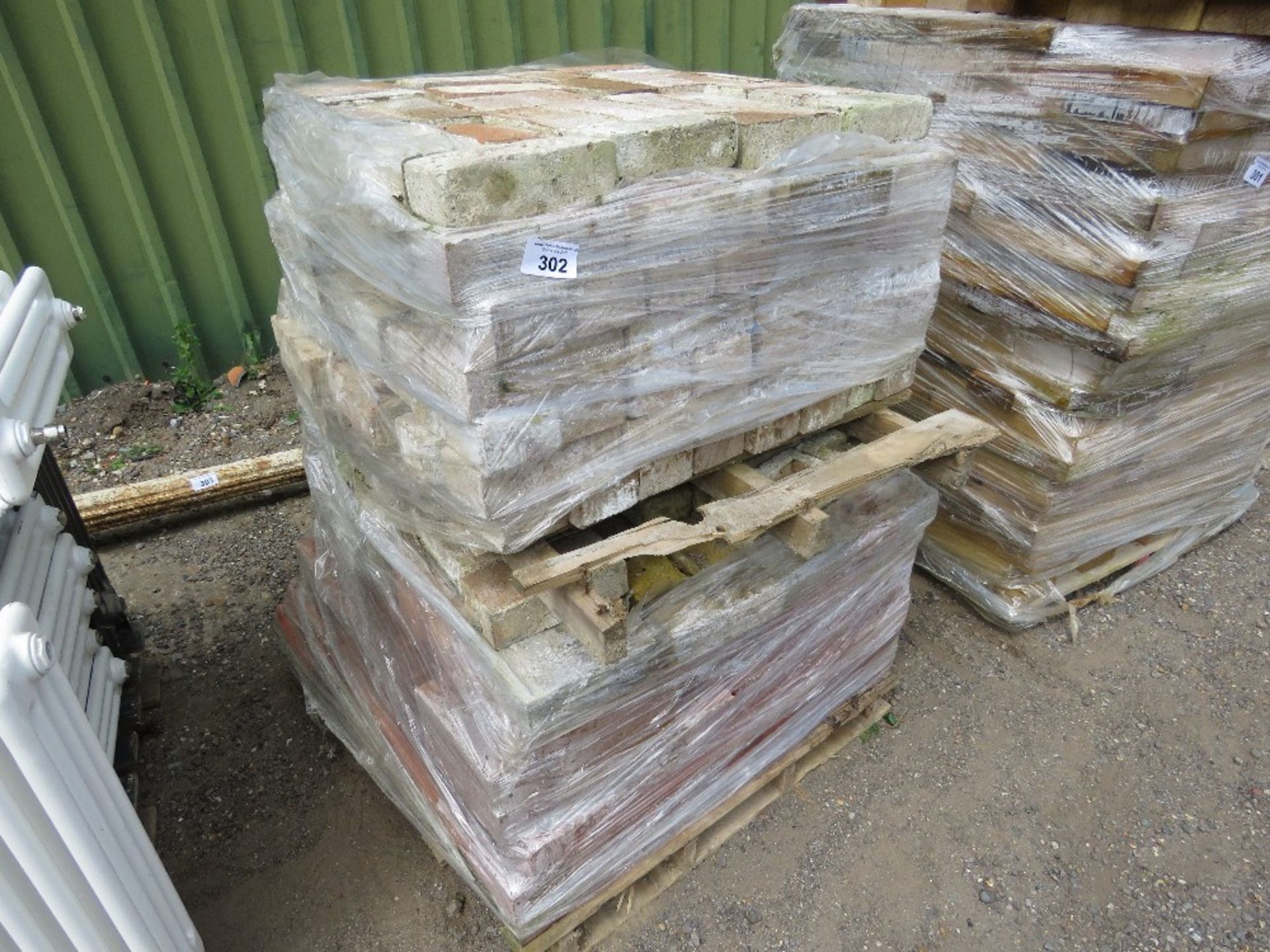 2 X PALLETS OF MAINLY RED BRICKS.