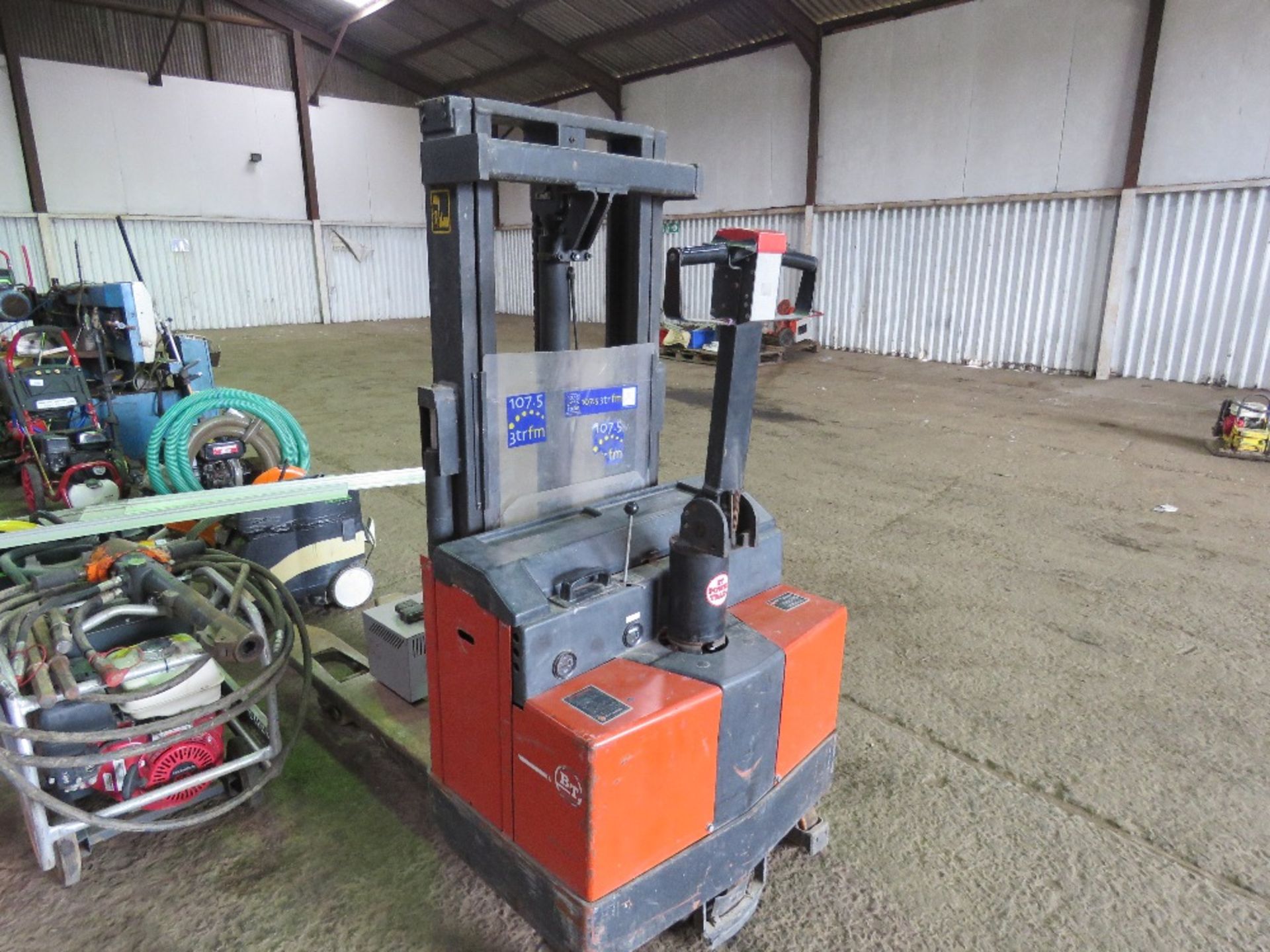 BT ROLATRUC BATTERY POWERED PALLET TRUCK/FORKLIFT WITH A CHARGER. WHEN TESTED WAS SEEN TO DRIVE AND - Image 3 of 11