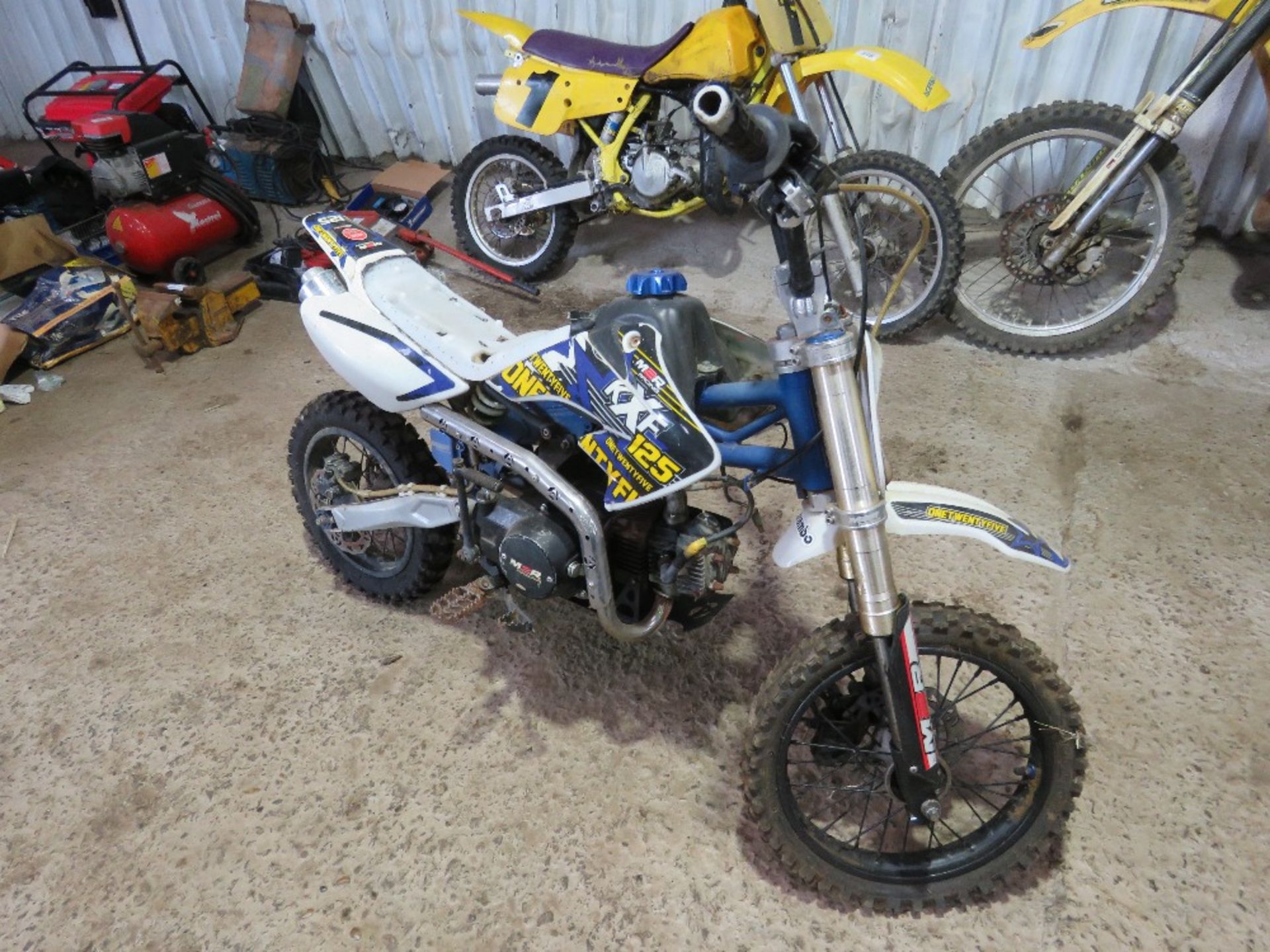 KXF125 CHILD'S SIZE MOTOCROSS TRIAL MOTORBIKE. BEEN IN STORAGE AND UNUSED FOR OVER 5 YEARS. THIS