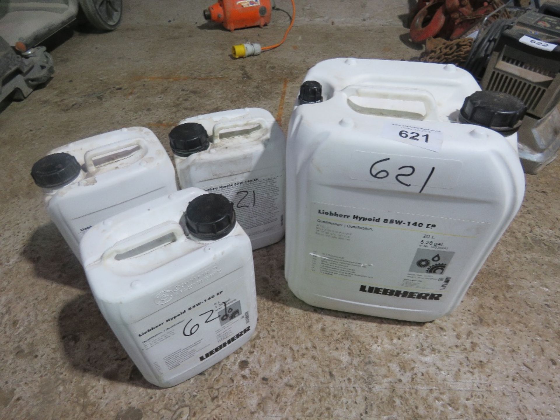 4 X LIEBHERR OIL CANS: HYPOID 85W140 AND A PART CAN OF ENGINE OIL. THIS LOT IS SOLD UNDER THE AUC