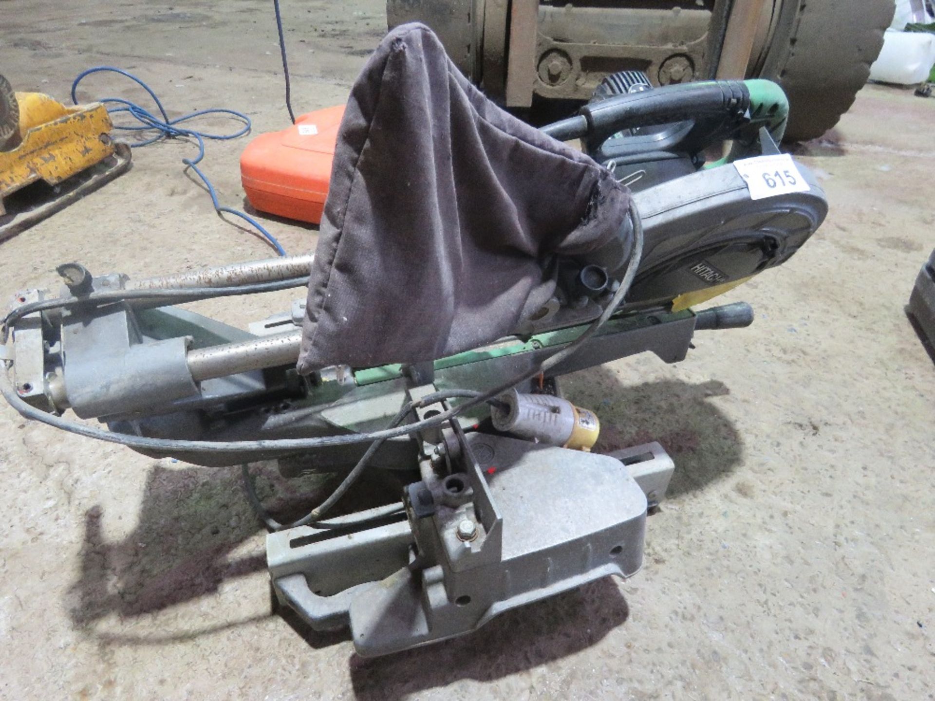 HITACHI SLIDING HEAD CHOP SAW.