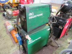 MIGATRONIC MIG WELDER WITH WIRE FEED HEAD.