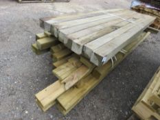 ASSORTED TIMBER POSTS AND FENCING TIMBERS.