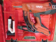 HILTI GX120ME NAIL GUN IN A CASE.