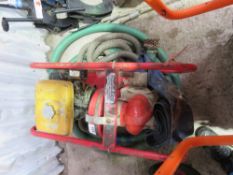 PETROL ENGINED WATER PUMP WITH HOSES.