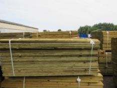 LARGE PACK OF PRESSURE TREATED FEATHER EDGE FENCE CLADDING TIMBER BOARDS. 1.65M LENGTH X 100MM WIDTH