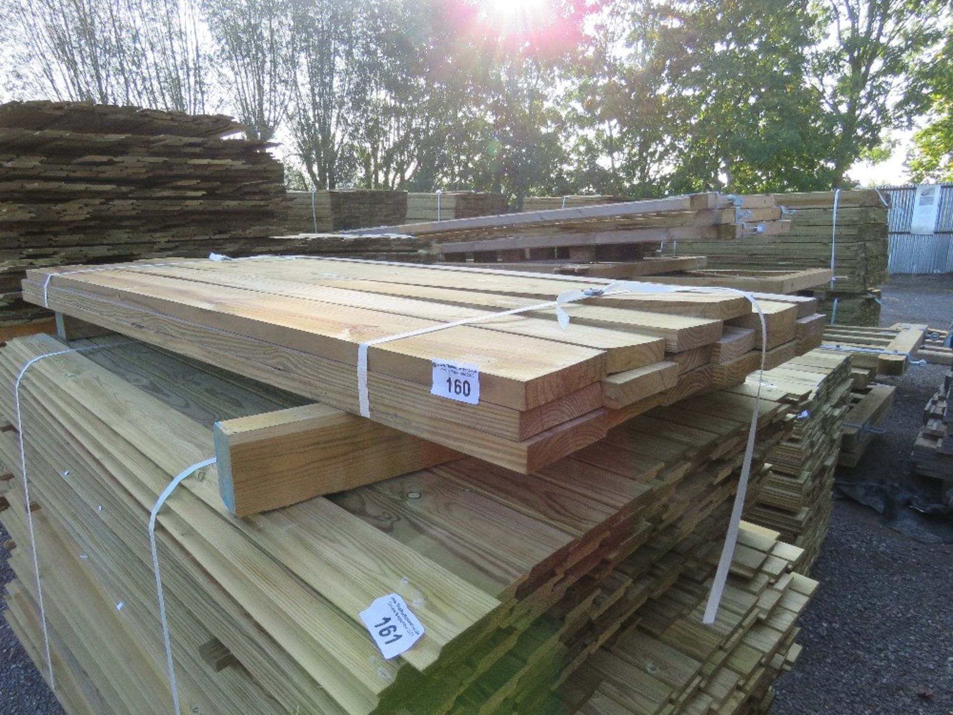 SMALL BUNDLE OF PRESSURE TREATED TIMBER BOARDS 1.83M X 140MM X 30MM APPROX.