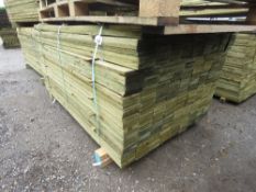 LARGE PACK OF TREATED FEATHER EDGE TIMBER CLADDING BOARDS: 1.65M LENGTH X 100MM WIDTH APPROX.