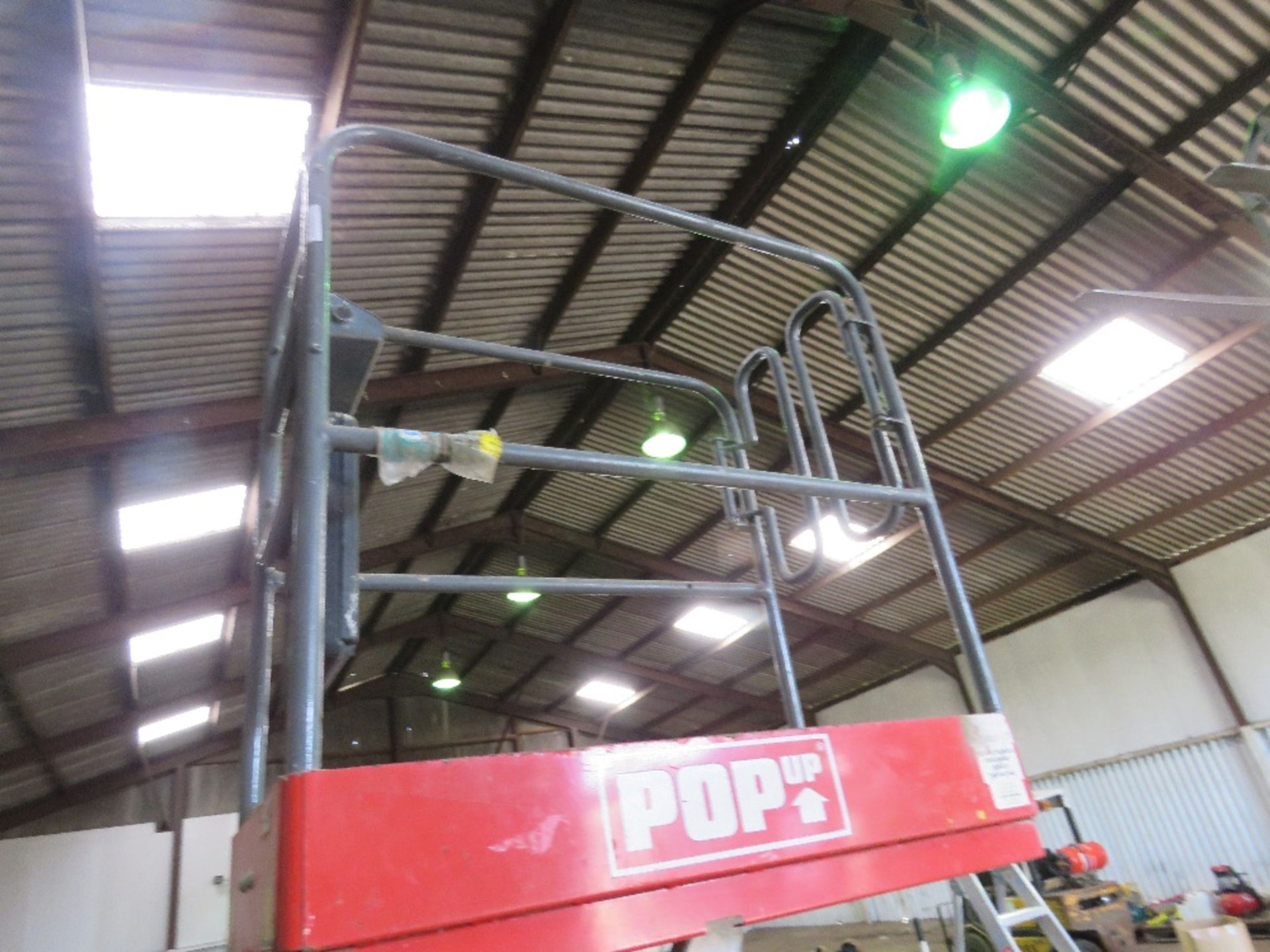 POPUP PUSH 6 PRO SCISSOR ACCESS LIFT. WHNE TESTED WAS SEEN TO LIFT AND LOWER. - Image 6 of 10