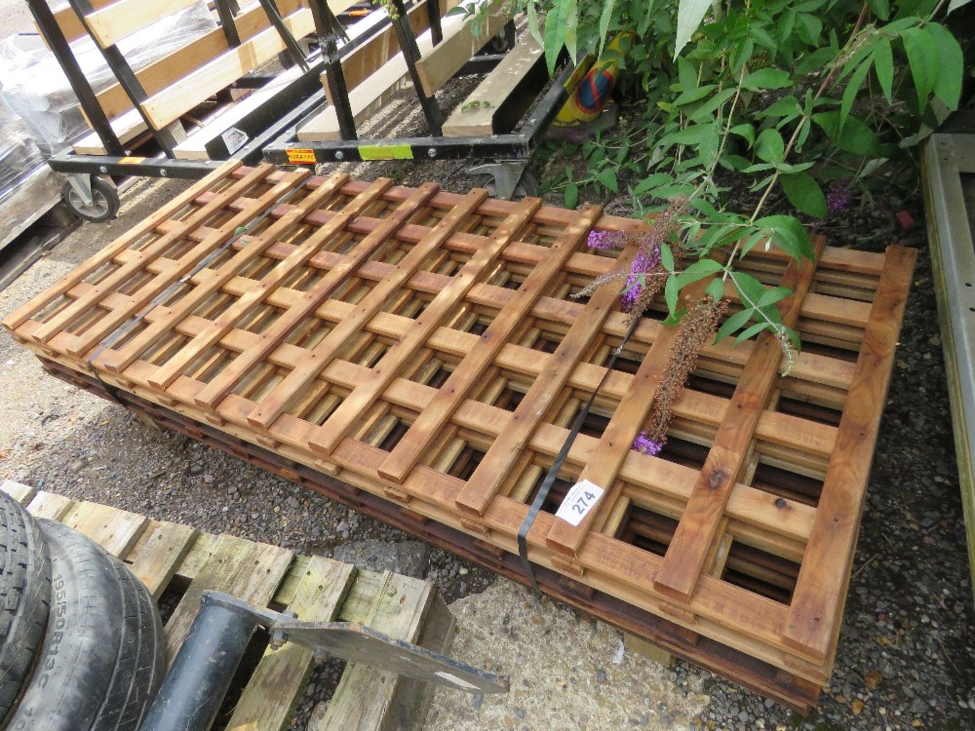 STACK OF 8NO WOODEN TRELLIS PANELS 1.68M X 0.72M APPROX. THIS LOT IS SOLD UNDER THE AUCTIONEERS M