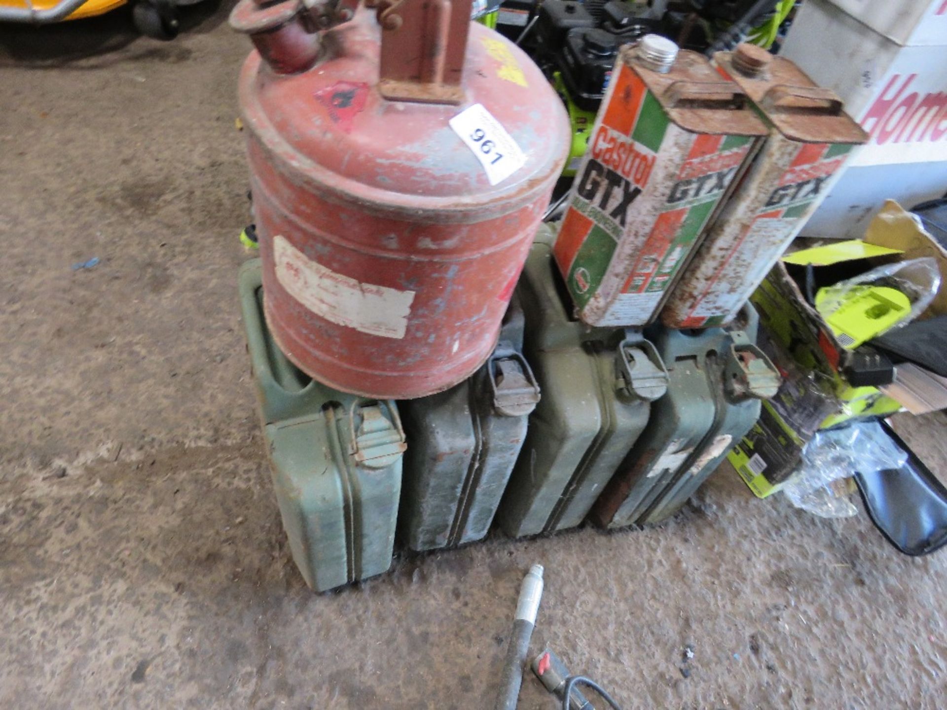 4 X GERRY CANS, A FUEL CANNISTER AND 2 NO GTX CANS. THIS LOT IS SOLD UNDER THE AUCTIONEERS MARGIN