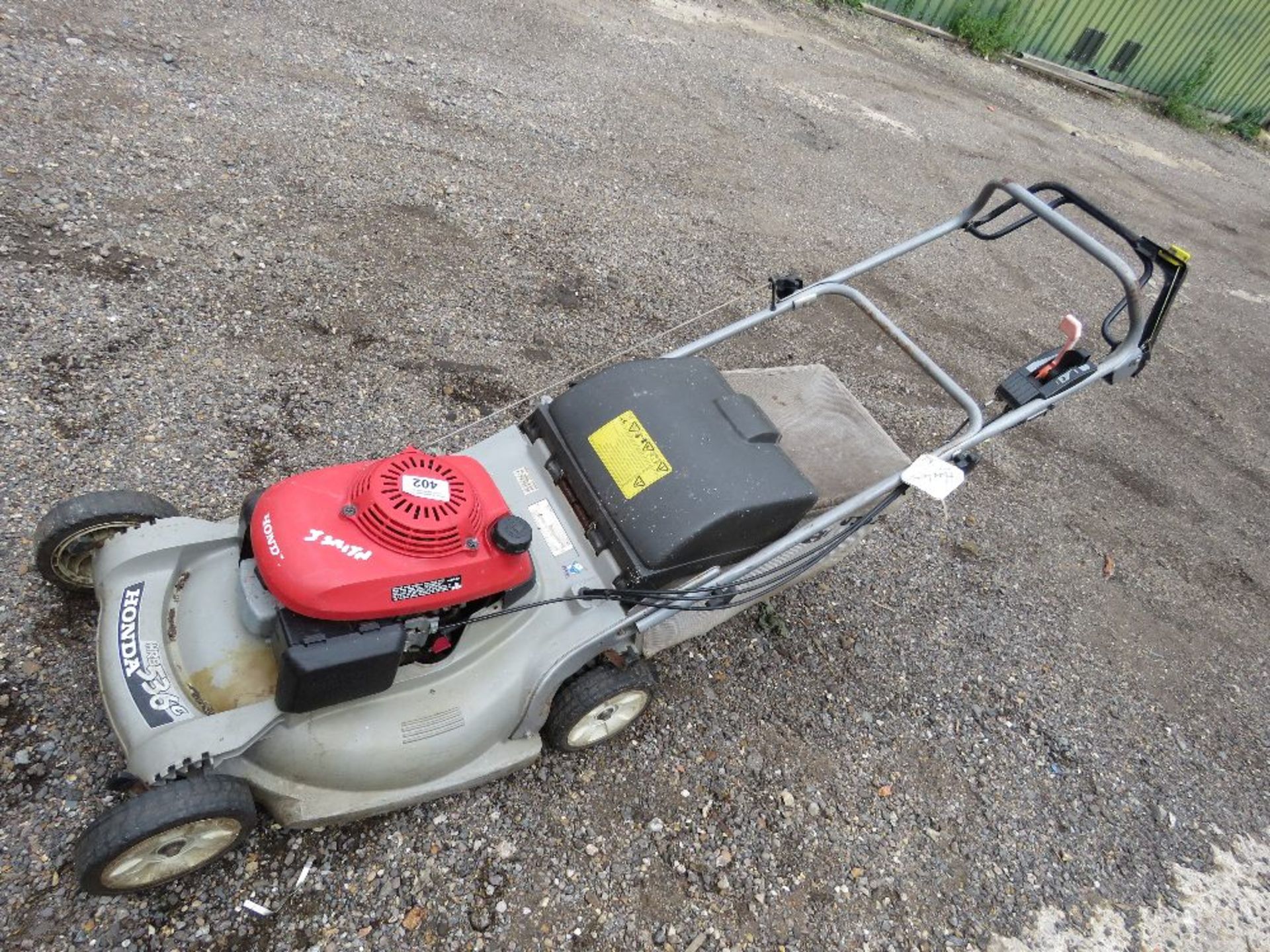 HONDA PETROL MOWER WITH A COLLECTOR. THIS LOT IS SOLD UNDER THE AUCTIONEERS MARGIN SCHEME, THEREF - Image 2 of 3