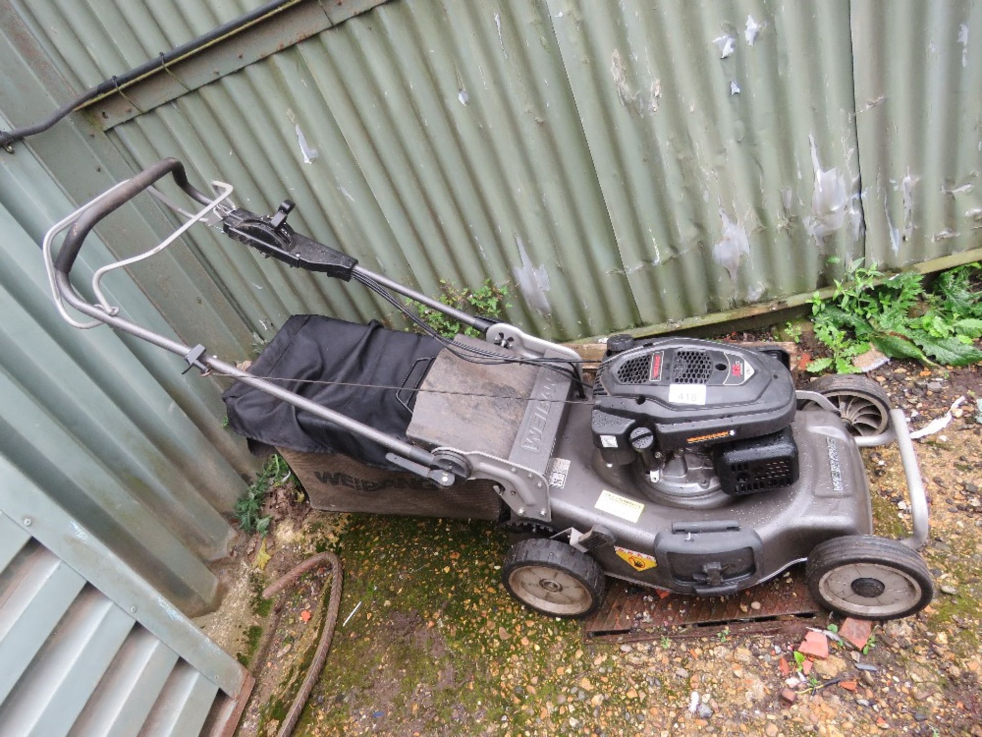 WEIBANG PROFESSIONAL LAWNMOWER WITH COLLECTOR. DIRECT FROM LOCAL LANDSCAPE COMPANY WHO ARE CLOSING A