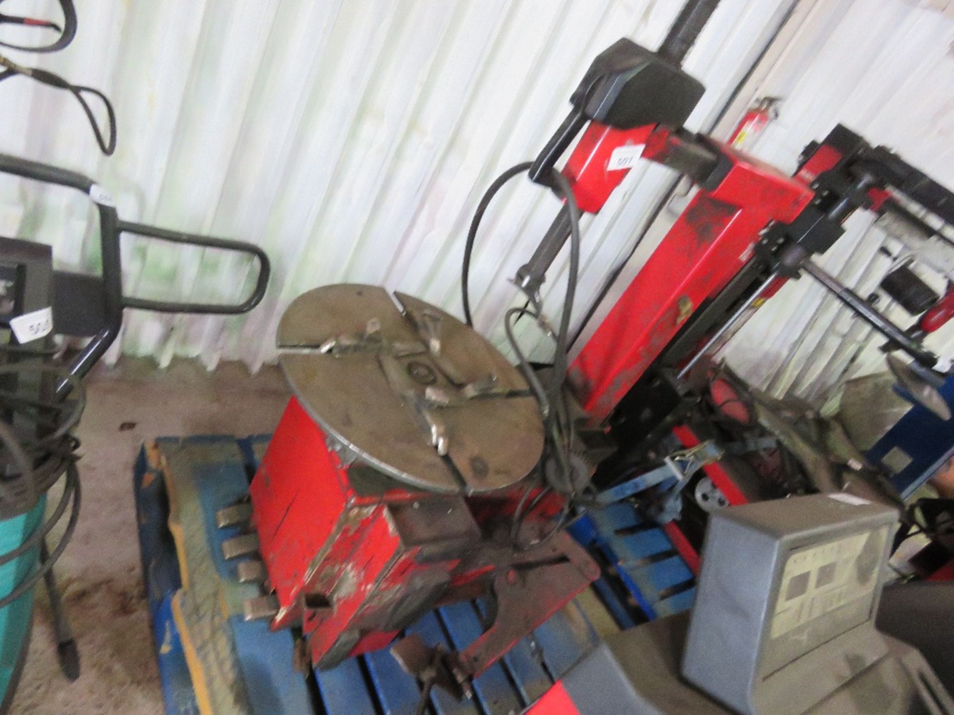 TYRE REMOVING MACHINE, 240VOLT POWERED. WORKING WHEN REMOVED FROM GARAGE LIQUIDATION. THIS LOT IS