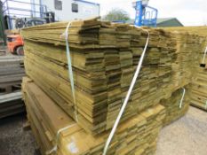 LARGE PACK OF PRESSURE TREATED FEATHER EDGE FENCE CLADDING TIMBER BOARDS. 1.65M LENGTH X 100MM WIDTH