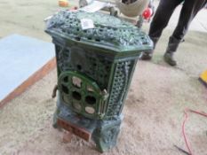 GREEN ENAMELLED CAST IRON STOVE.