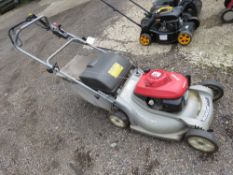 HONDA PETROL MOWER WITH A COLLECTOR. THIS LOT IS SOLD UNDER THE AUCTIONEERS MARGIN SCHEME, THEREF