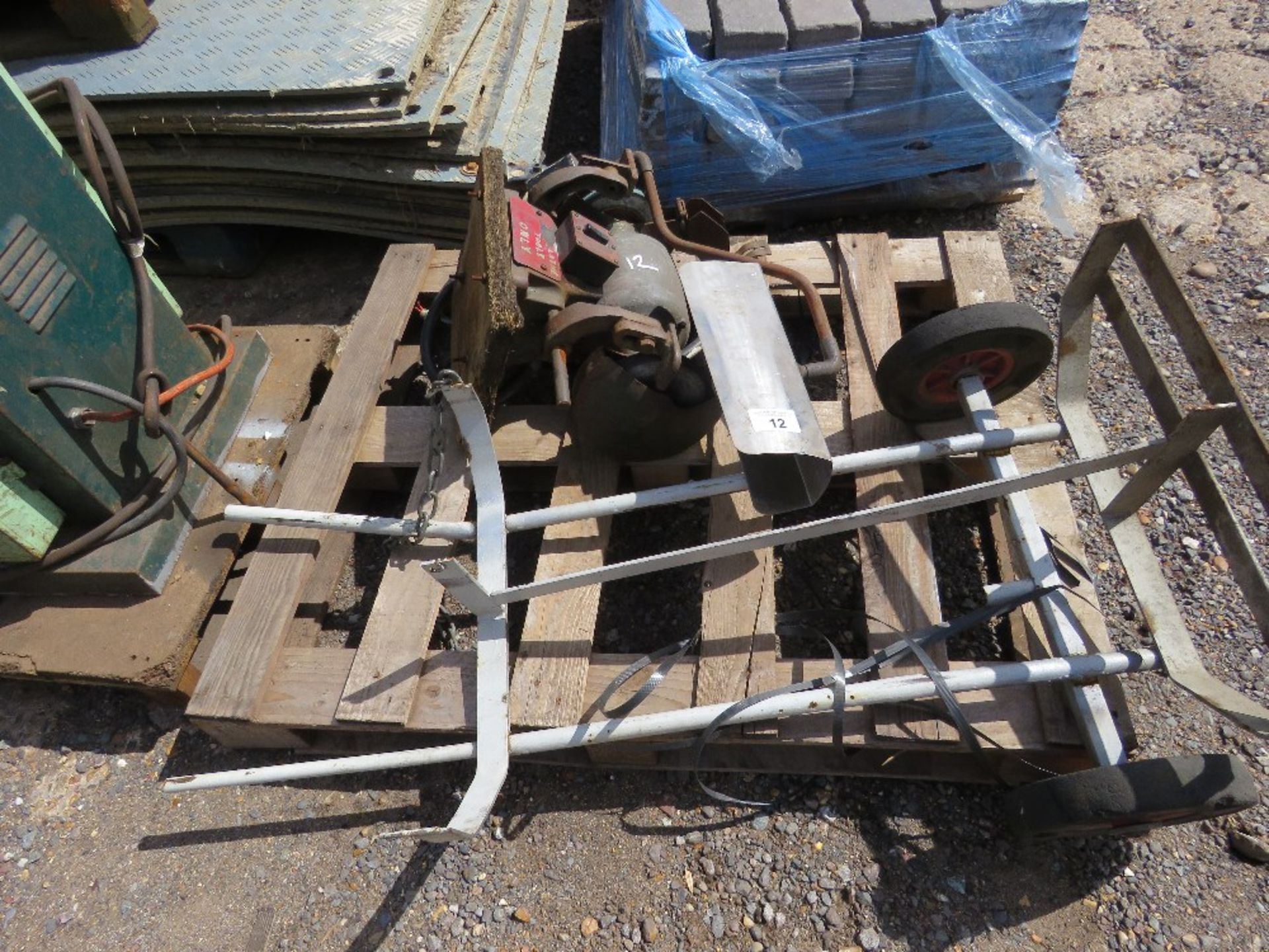 BENCH GRINDER PLUS A BOTTLE TROLLEY. THIS LOT IS SOLD UNDER THE AUCTIONEERS MARGIN SCHEME, THEREF