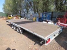 WOODFORD TRIAXLE FLAT BED TRAILER 20FT X 7FT YEAR 2019, WITH RAMPS. DESCRIBED AS A LAZY ASSET.