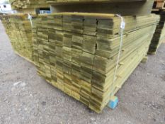 LARGE PACK OF TREATED FEATHER EDGE TIMBER CLADDING BOARDS: 1.8M LENGTH X 100MM WIDTH APPROX.