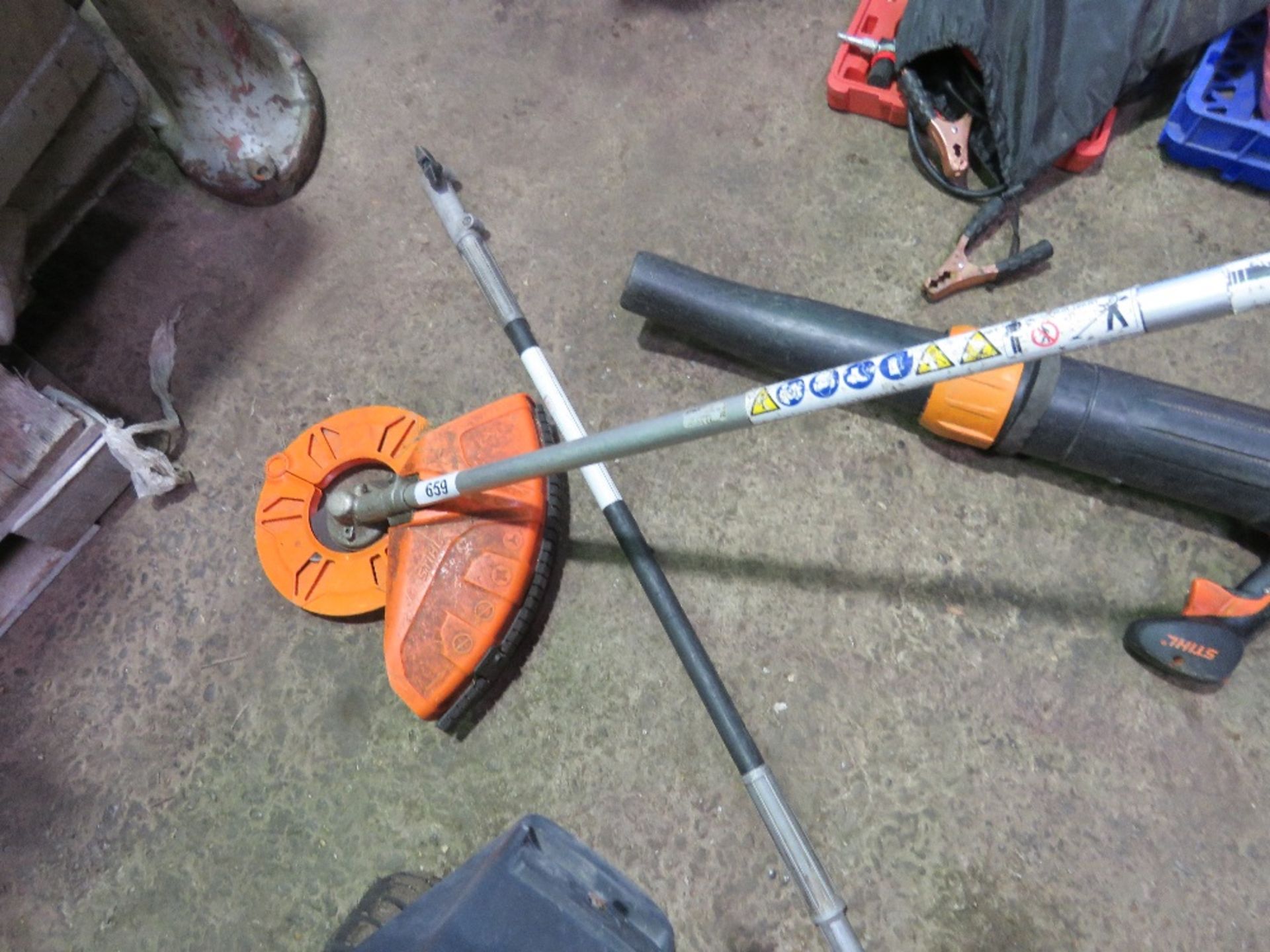 STIHL SPECIAL STRIMMER HEAD PLUS AN EXTENSION POLE. DIRECT FROM LOCAL LANDSCAPE COMPANY WHO ARE CLOS