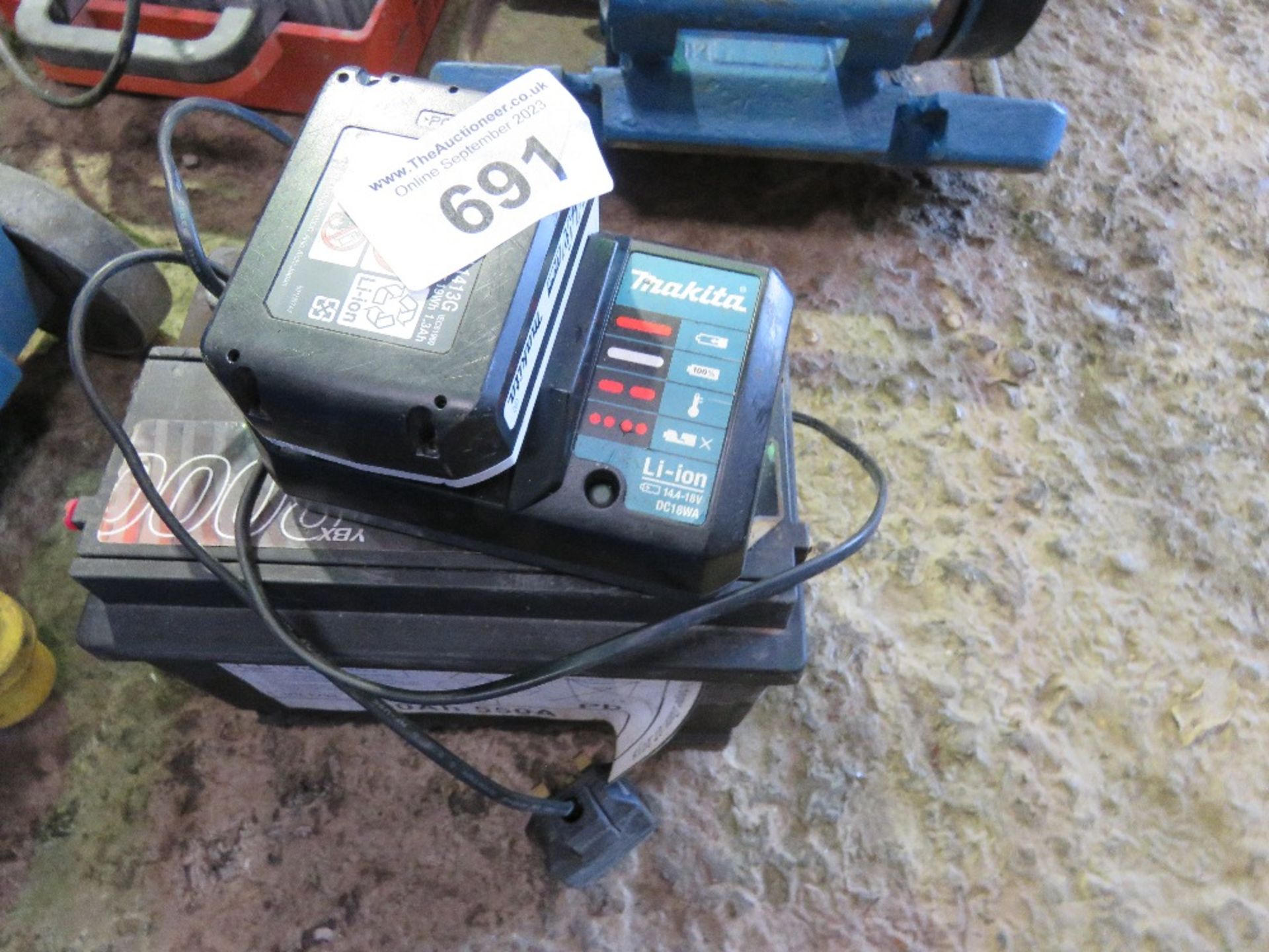 CAR BATTERY WITH A MAKITA BATTERY PLUS CHARGER. - Image 2 of 2