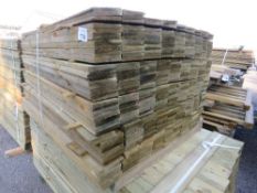 PACK OF PRESSURE TREATED FEATHER EDGE FENCE CLADDING TIMBER BOARDS. 1.2M LENGTH X 100MM WIDTH APPROX