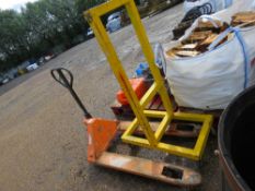 PALLET TRUCK PLUS A WHEELED FRAME UNIT. THIS LOT IS SOLD UNDER THE AUCTIONEERS MARGIN SCHEME, THE