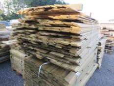 LARGE PACK OF PRESSURE TREATED SHIPLAP TYPE FENCE CLADDING TIMBER BOARDS. 1.15-1.9M LENGTH X 100MM W