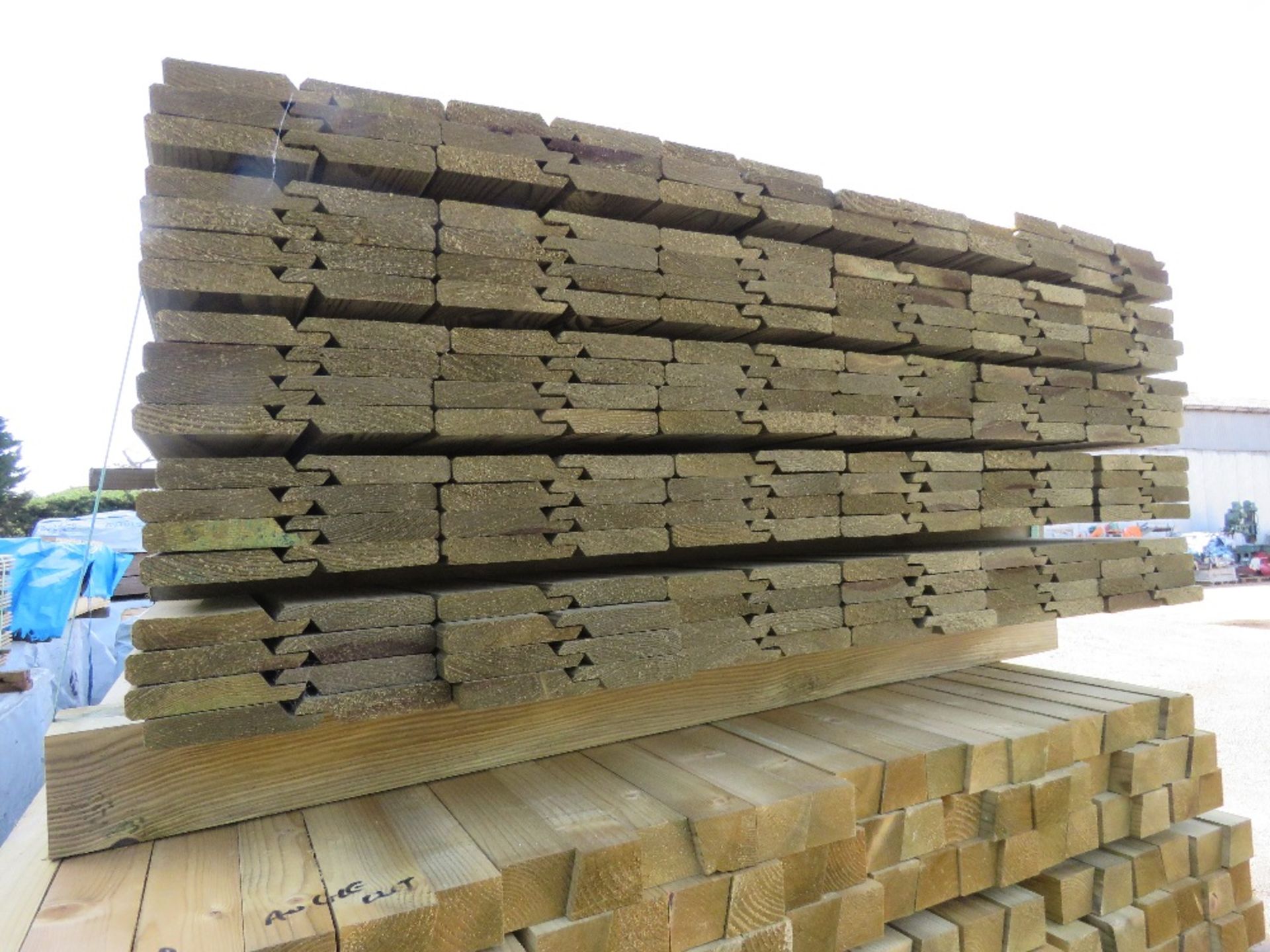 PACK OF TREATED SHIPLAP FENCE PANEL EDGE STRIPS 1.7M LENGTH APPROX. - Image 2 of 6