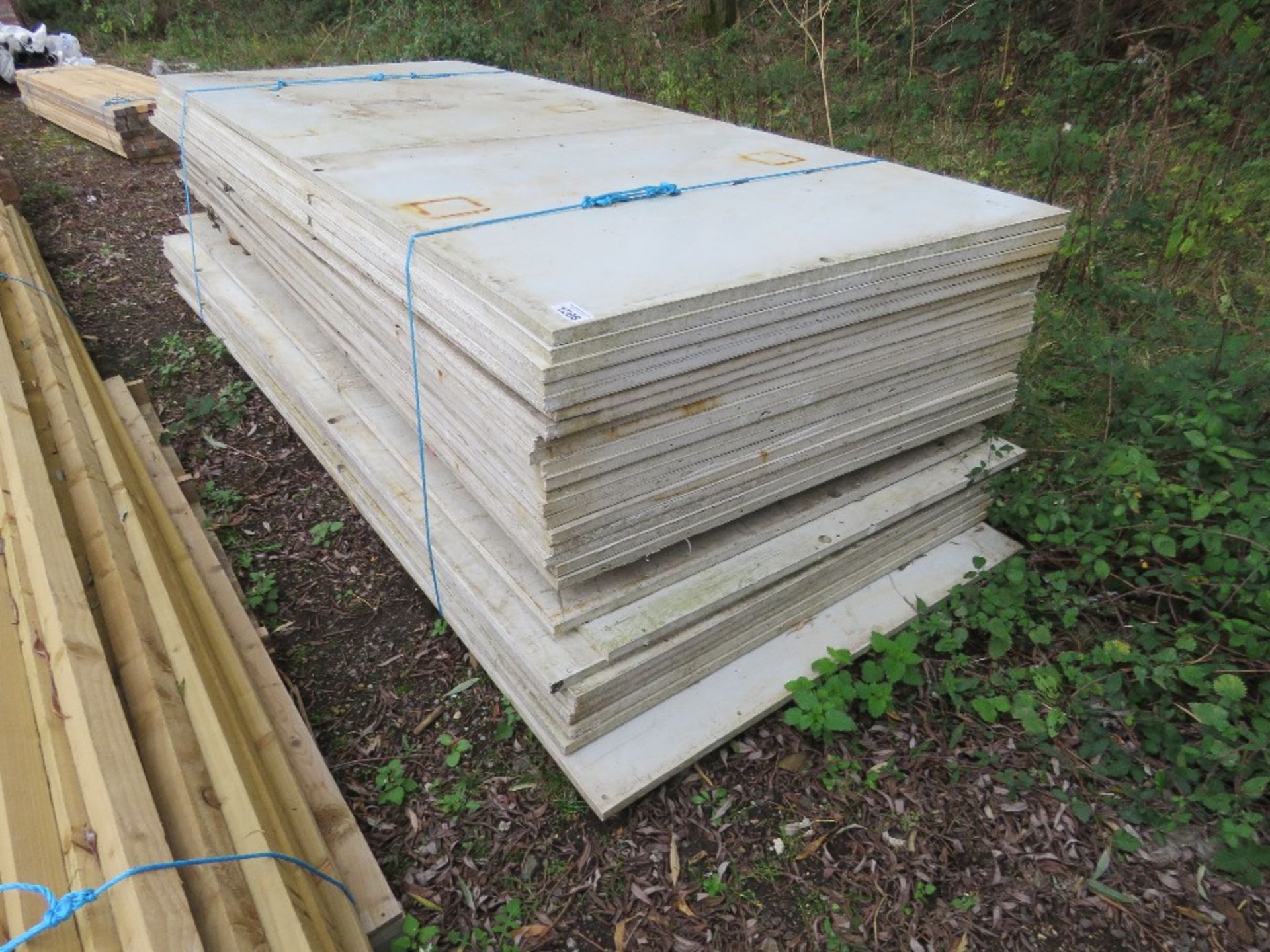 28NO COMPOSITE / PLASTIC COATED BOARDS 1.24M X 2.98M APPROX 24MM THICK. THIS LOT IS SOLD UNDER TH