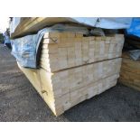 LARGE PACK OF UNTREATED RAILS WITH CHAMFERRED EDGE. 2.4M LENGTH X 35 X 85MM MAXIMUM WIDTH APPROX.