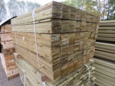 LARGE PACK OF PRESSURE TREATED FEATHER EDGE FENCE CLADDING TIMBER BOARDS. 1.35M LENGTH X 100MM WIDTH